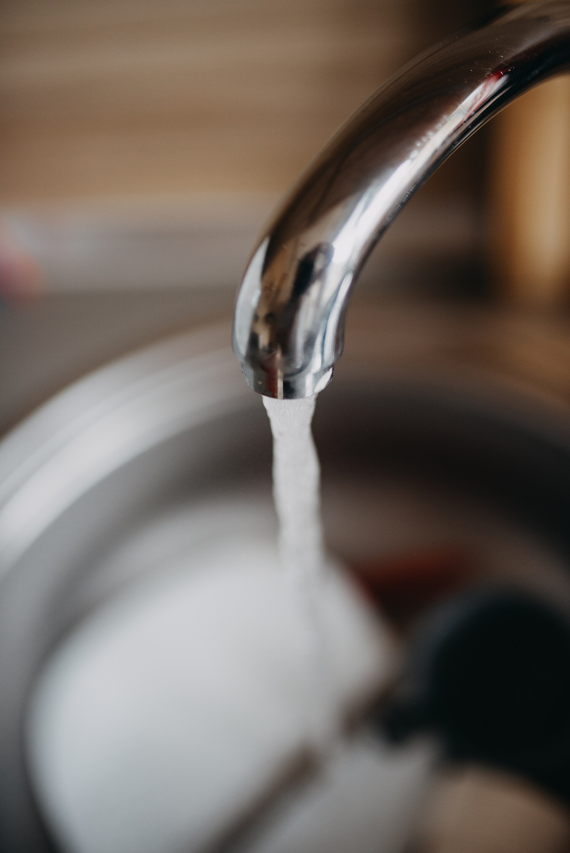 Illustrative photograph of water from a kitchen faucet. Not this business's work. Shixart1985, CC BY 2.0, Wikimedia Commons.