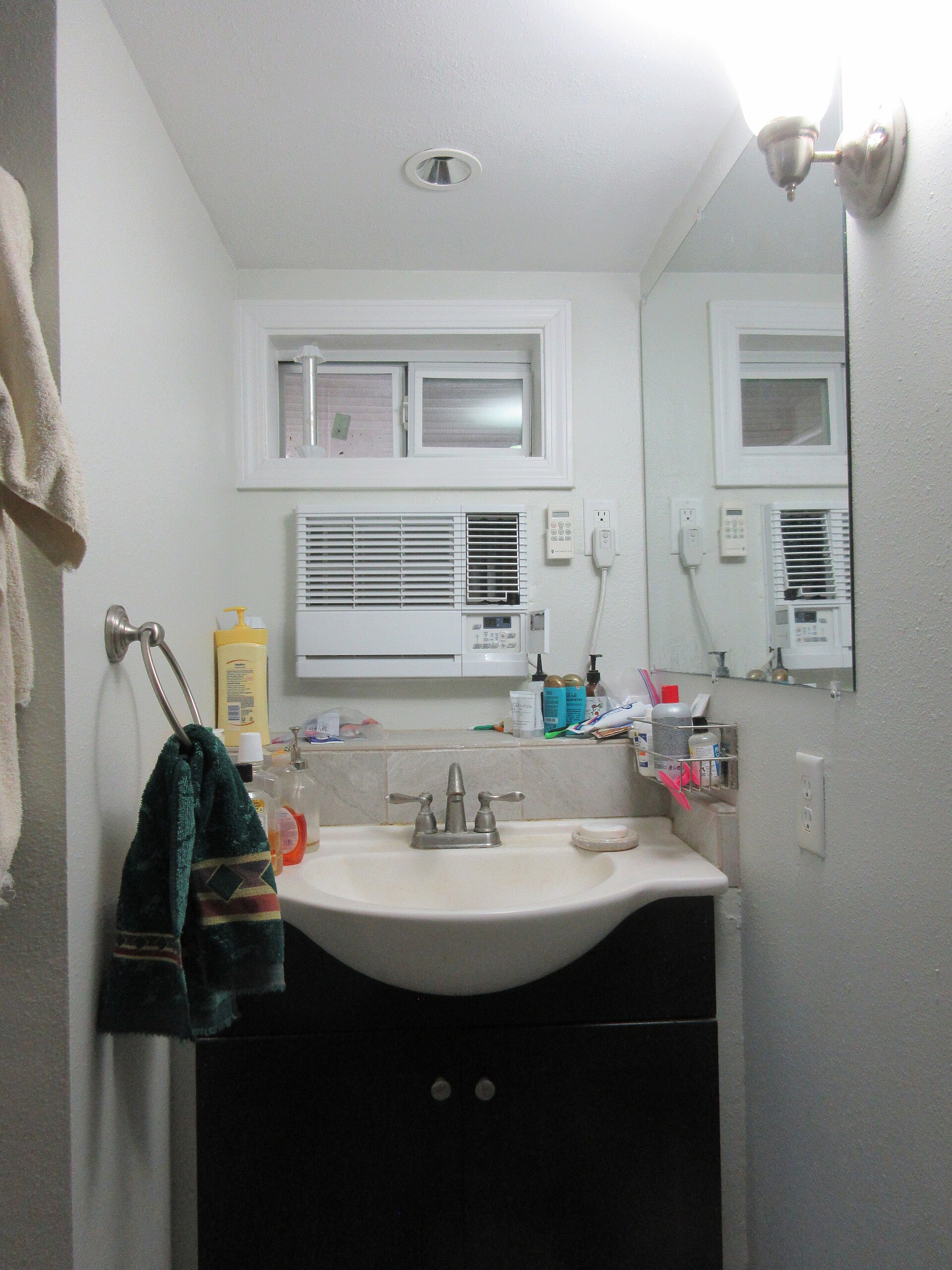 Illustrative photograph of a bathroom sink. Not this business's work. Infrogmation, CC BY-SA 4.0, Wikimedia Commons.
