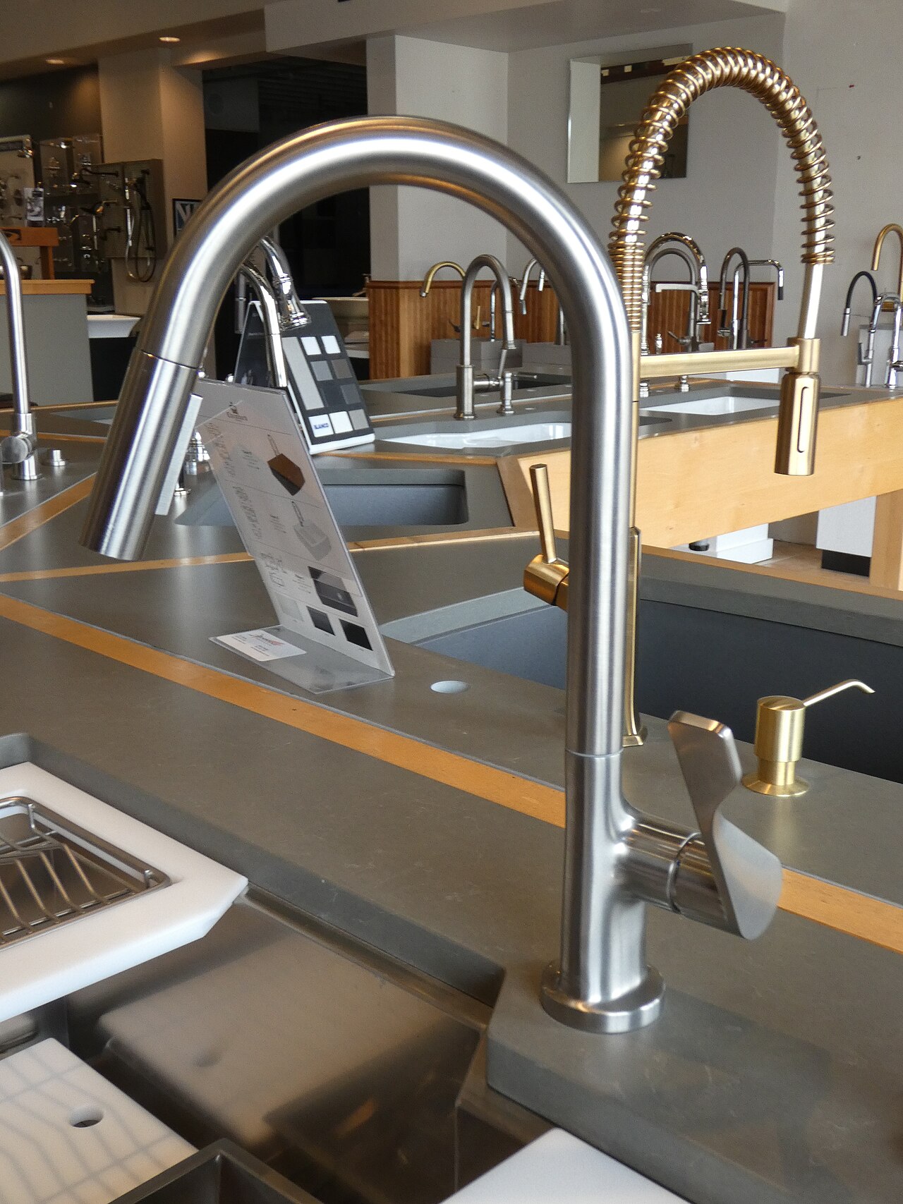 Illustrative photograph of a kitchen faucet. Not this business's work. Stilfehler, CC0, Wikimedia Commons.